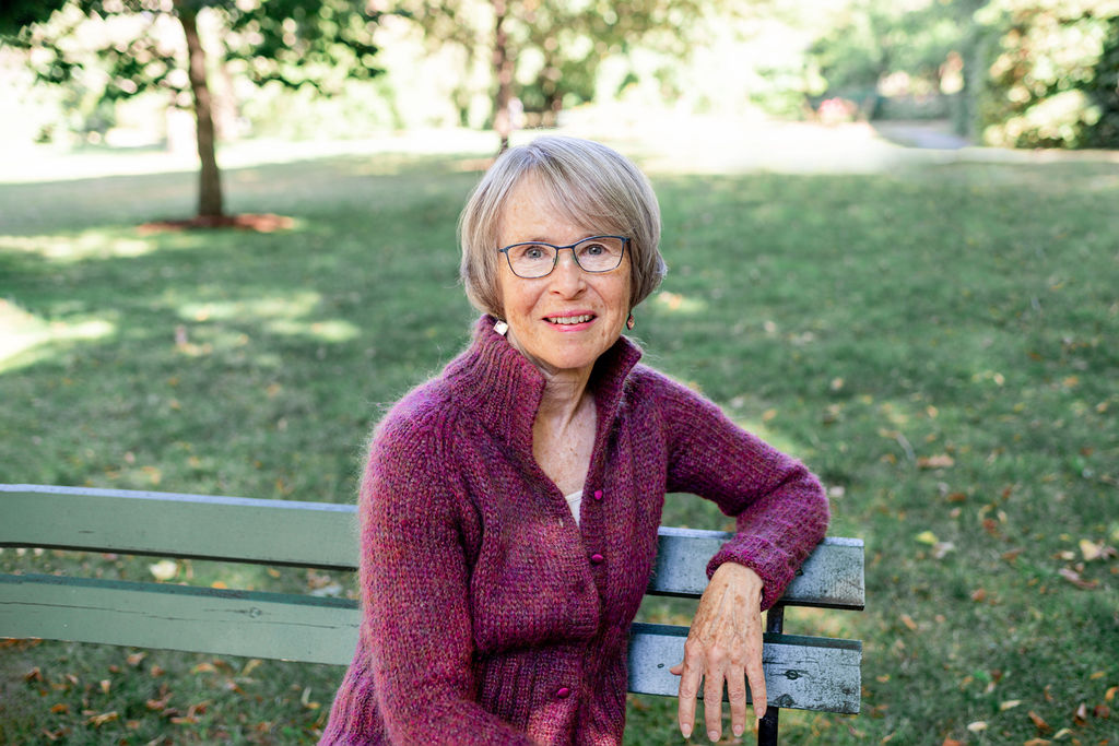 Photo of author seated.