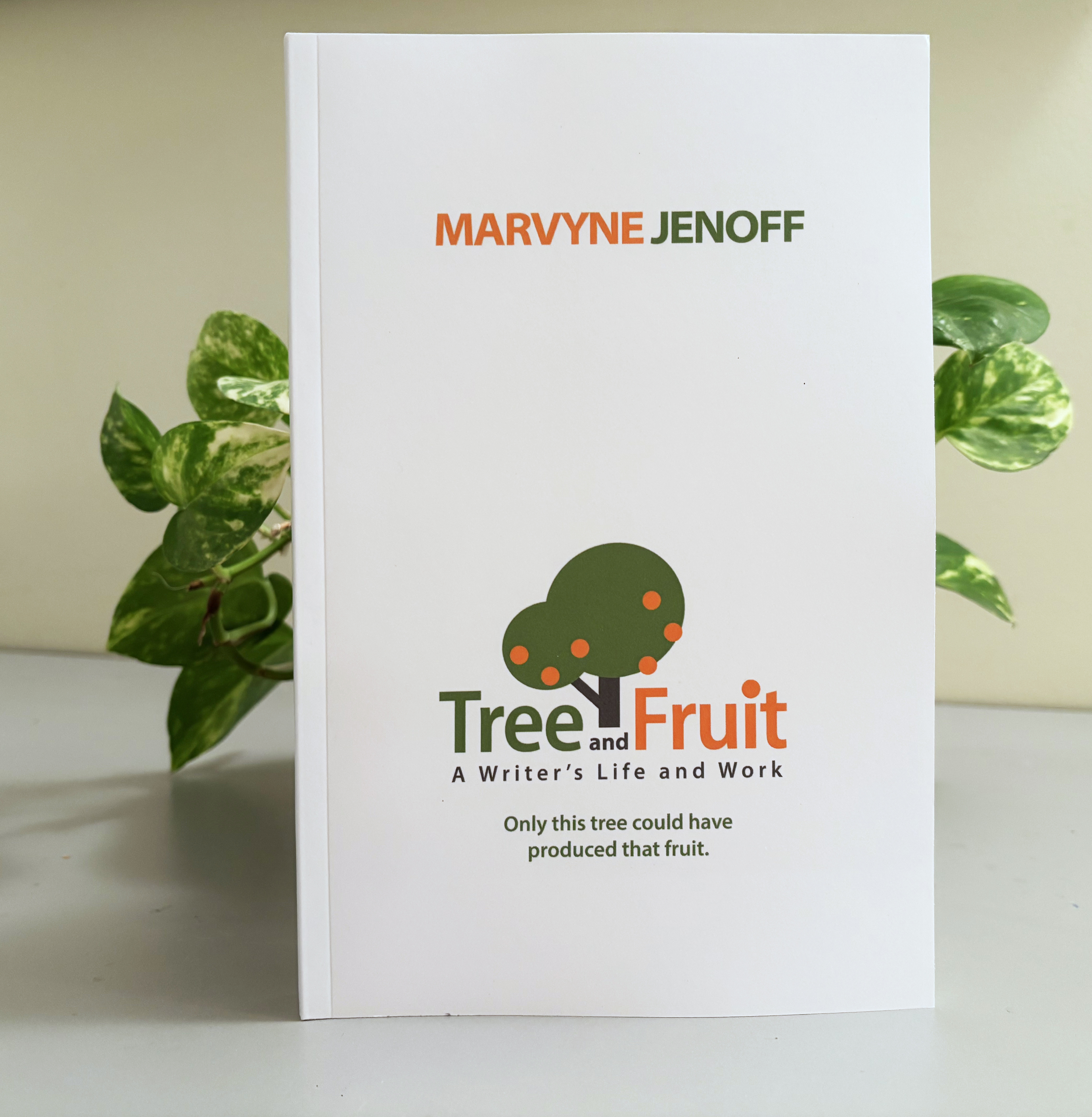 the front cover, white, with a stylized tree and generic fruit